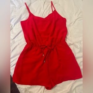 Pink/orange romper with pockets. Never worn. Nwt